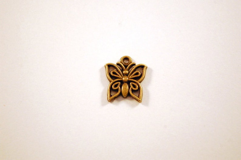 Charm Bronze Schmetterling Bild 1