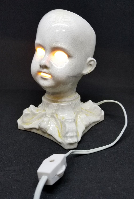 The Original Creepy Doll head lamp.