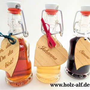 Bottle as a guest gift and place card for the wedding