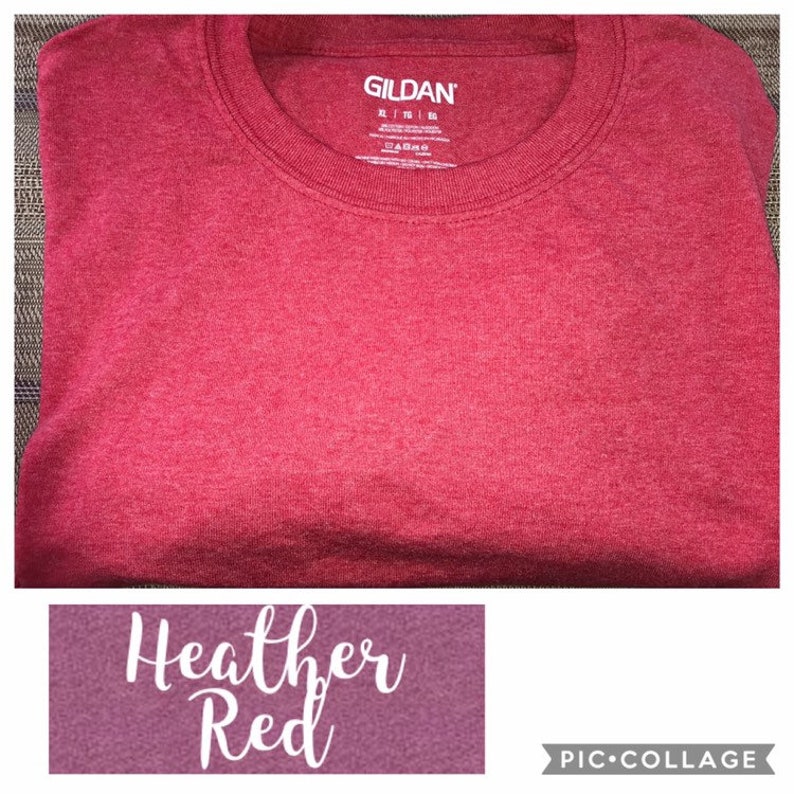 May include: A red heather Gildan t-shirt. The tag is visible and says "Gildan" in white letters.