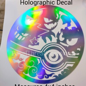 May include: A holographic decal featuring a circular design with a white eye and clouds in the bottom half. The top half features a silhouette of a Pokemon character. The decal measures 4x4 inches. "Holographic Decal" and "Measures 4x4 inches" are printed in black text on a white background.