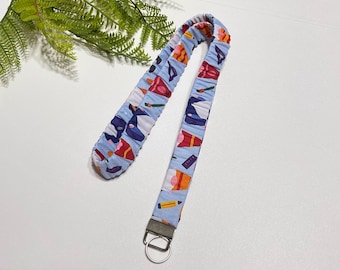 Handgemaakte katoenen scrunchiesleutelhangerset: Teacher Gnomes-stof