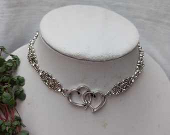 Traditional choker collar made of intertwined hearts + various chains on the side antique silver