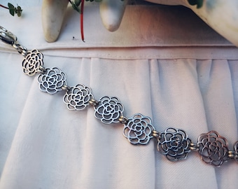 Fashionable apron chain for dirndl antique silver made of many filigree rose petals - traditional costume jewelry