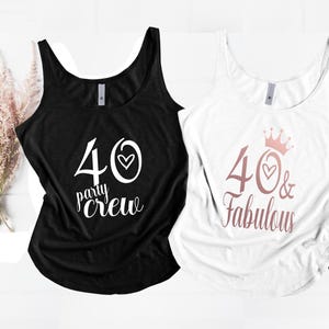 May include: Two tank tops, one black and one white, with the text "40 party crew" and "40 & fabulous" printed on them. The text is in white and pink.