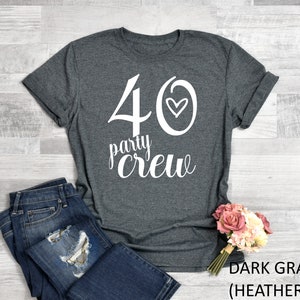 May include: Dark gray heather t-shirt with white text that says "40 party crew" with a heart symbol.