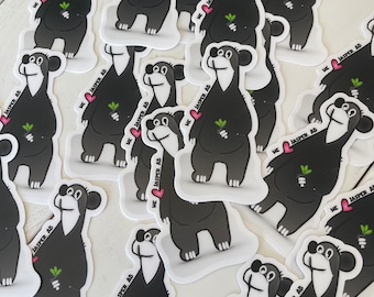 May include: Multiple black bear stickers with a green sprout and a pink heart with the text "ME JASPER AB" on each sticker.