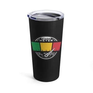May include: A black travel tumbler with a white lid. The tumbler features a "FUN METER" design with green, yellow, and red sections, and a needle pointing towards "MAX." The design includes the words "MIN." and "MED." below the meter.