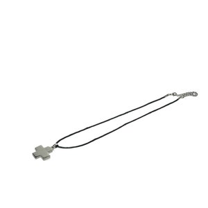 May include: A silver cross pendant on a black cord necklace.