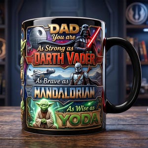 May include: Black ceramic mug with a Star Wars theme. The mug features Darth Vader, the Mandalorian, and Yoda, with text that reads "DAD You are As Strong as Darth Vader, As Brave as Mandalorian, As Wise as Yoda."