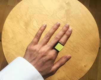 Neon Green Linoleum Ring: Geometric Black Band, Futuristic Jewelry