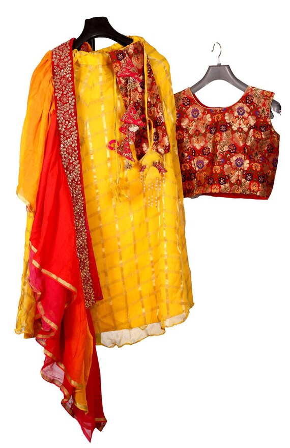 yellow dress with red dupatta