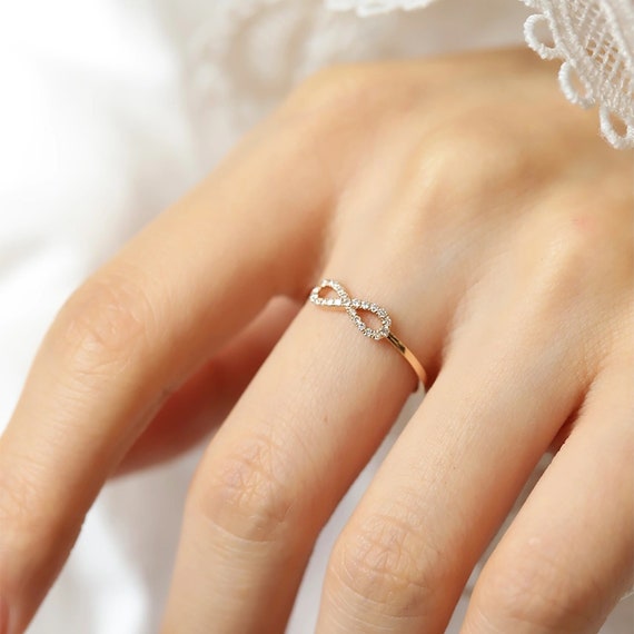 Twisted Infinity Engagement Ring with Side Stones | Jewlr
