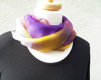 A fragrant silk chiffon scarf painted in a color gradient