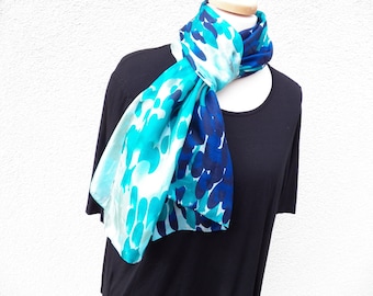 A fragrant silk scarf in light blue, blue, green, a little olive.