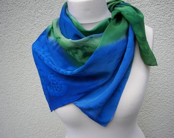 An elegant silk scarf Crepe de Chine 10 hand painted with French colors in the color gradient of blue and green tones.