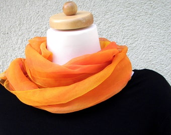 A gossamer silk chiffon scarf painted with French colors in gradient orange, yellow, little pink.