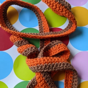 Crocheted snail band &quot;Lexi&quot; for small hands