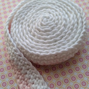 Crocheted snail band &quot;Coco&quot; for small hands