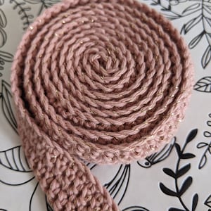 Crocheted glitter snail band for little hands