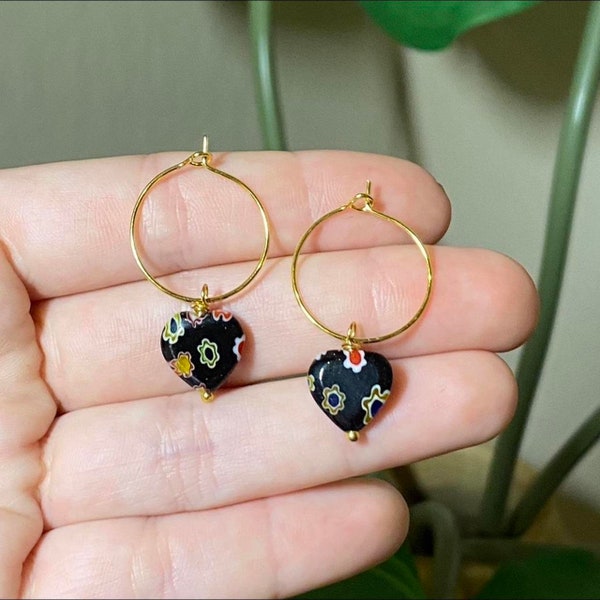 gold plated hoops with glasswork heart beads