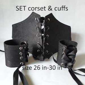 Set zwarte korsetriem en -manchetten: gothic piratenoutfit (maat 26–30 in.)
