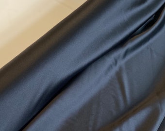 Pure silk ( mulberry silk) in bright black colour width 55.12 inc sold by the yard 100% silk fabric 19 momme