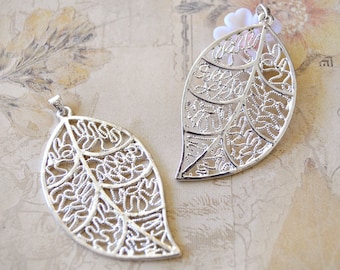 2 large elegant leaf-shaped pendants