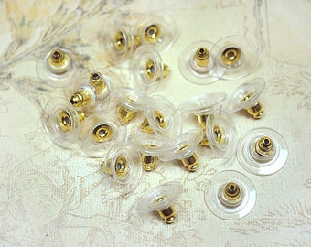 20 gold-colored earring stoppers