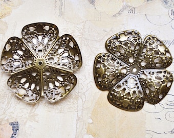 5 intricate flower-shaped connectors