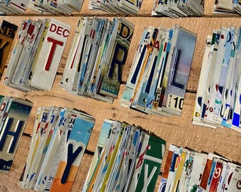 Bulk Worn & Faded Embossed Only License Plate Letters and Numbers - 25 Pieces