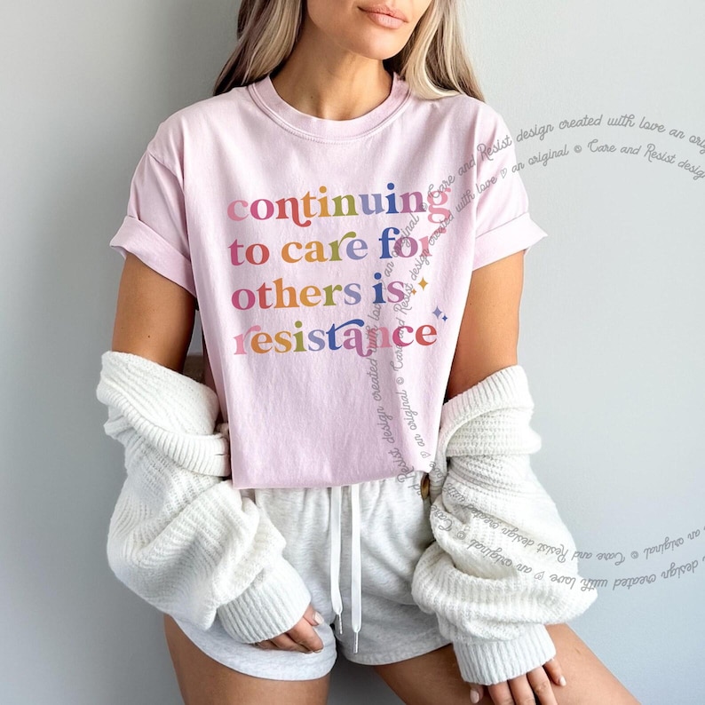 Kind kindness inclusion DEI diversity peace love equity liberal progressive t shirt t-shirt tshirt tee top apparel merch democrat hope solidarity activist activism protest equal rights diverse unity indivisible united stand divided we fall political compassion women LGBTQ trans transgender human being privilege rbg ruth Bader Ginsburg caring about other people mlk Martin luther king jr inspiration inspirational motivational motivate unity unite anti maga trump we rise by lifting others stand