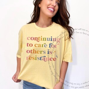 Kind kindness inclusion DEI diversity peace love equity liberal progressive t shirt t-shirt tshirt tee top apparel merch democrat hope solidarity activist activism protest equal rights diverse unity indivisible united stand divided we fall political compassion women LGBTQ trans transgender human being privilege rbg ruth Bader Ginsburg caring about other people mlk Martin luther king jr inspiration inspirational motivational motivate unity unite anti maga trump we rise by lifting others stand