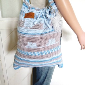 Handmade crocheted shopping bag, blue, beige, patterned, with charm, lined