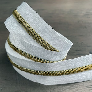 Light Gold teeth on White tape Nylon zipper by the yard size #5