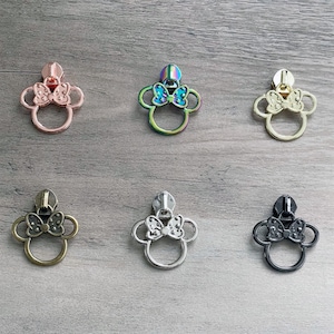 Mouse with Bow zipper pulls (5 pcs) designed for #5 nylon zipper tape.  No. 5 zipper pulls