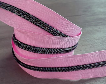 Iridescent teeth on Pink Lemonade tape Nylon zipper by the yard size #5
