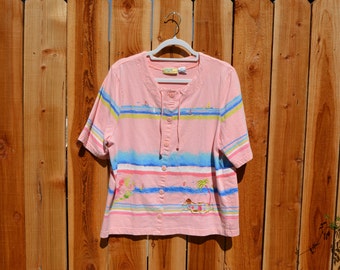 Vintage 1990s Onque Casuals Pink Island Print Embroidered Button Down Short Sleeve Knit Shirt