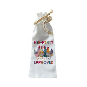 May include: White drawstring wine bag with the text "HEN-PARTY APPROVED" in colorful letters. The bag features a row of six colorful chickens. The drawstring is made of a beige rope.