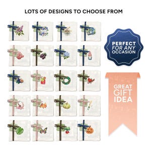 May include: A collection of 20 different tea towel designs, each featuring a unique illustration. The designs include a variety of themes, such as flowers, vegetables, animals, and holidays. The tea towels are all white with a light gray checkered pattern. The text "Lots of designs to choose from" is at the top of the image. The text "Perfect for any occasion" is in a blue circle at the top right of the image. The text "Great gift idea" is in a pink rectangle at the bottom right of the image.