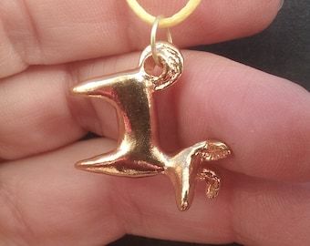 24K gold Flying Pig pendant with yellow cord