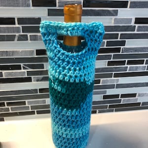 Crochet wine bottle cozy with built in handles