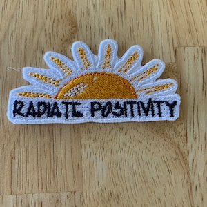 Radiate Positivity Bügelbild, Applikation