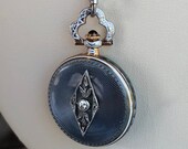 Vintage Art Deco 14 Karat Gold Guilloche Enamel Marcus Co. New York Watch Drop Pendant with Diamonds