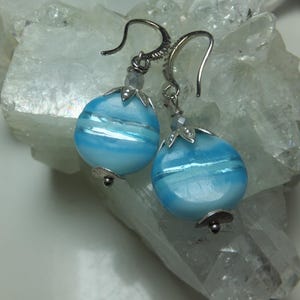 Earrings Murano glass, hand painted, with light and medium blue with silver pearl caps, earrings, brisures are diamond silver plated,