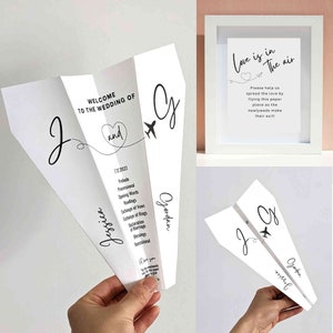 Op de afbeelding: Wit papieren vliegtuig huwelijks programma met de namen Jessica en Gordon en de tekst "Love is in the air" op een apart bord. Het programma geeft de volgorde van de huwelijksceremonie weer.