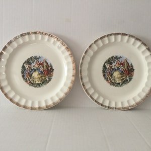 a pair of the Victorian Courting Couple Scene Porcelain Plates
