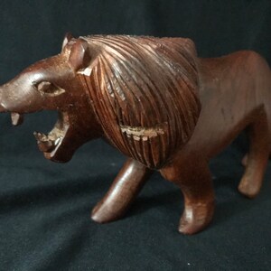 Vintage Carved wooden lion figurine