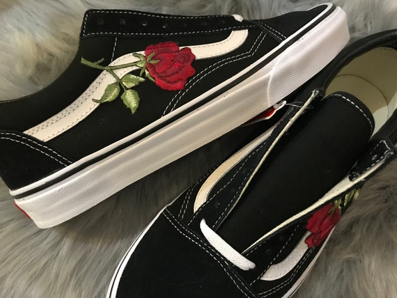black vans with roses embroidered