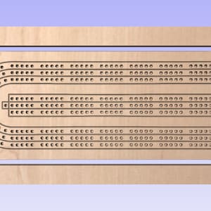 May include: A wooden cribbage board with a traditional oval track design. The board has multiple rows of holes for pegs and a scoring area.